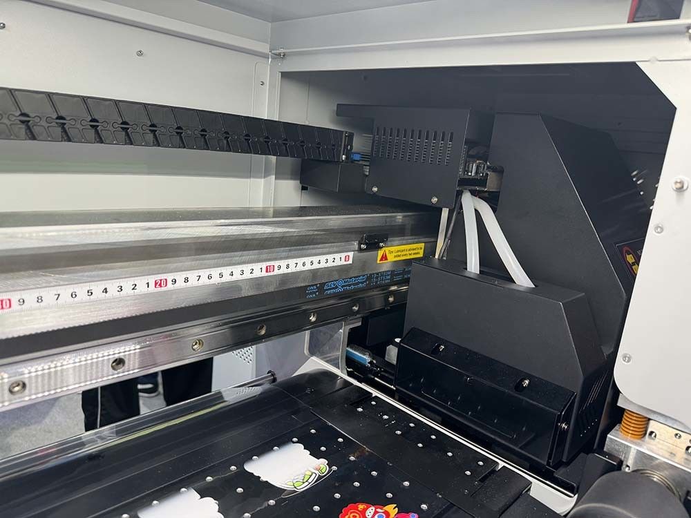 A2 A3 Digital 60cm DTF Sticker UV Printer Glass Metal Printer với đầu 13200 U1